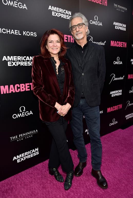 FILE - Rosanne Cash, left, and husband John Leventhal attend the