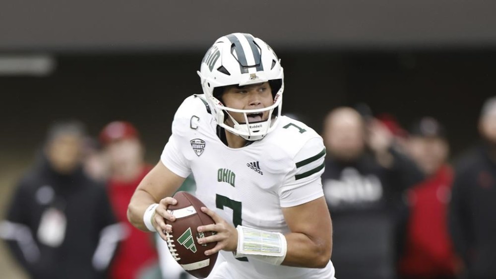 Ohio Bobcats quarterback Kurtis Rourke (7) looks to pass the ball against Northern Illinois Huskies during the second half of an NCAA football game on Saturday, Oct. 14, 2023, in Dekalb, Ill. The six-foot-five, 230-pound Oakville, Ont., native is entering his sixth American college football season but first at Indiana University. He transferred to Bloomington, Ind., in December after five years at Ohio University in Athens, Ohio. THE CANADIAN PRESS/AP-Kamil Krzaczynski