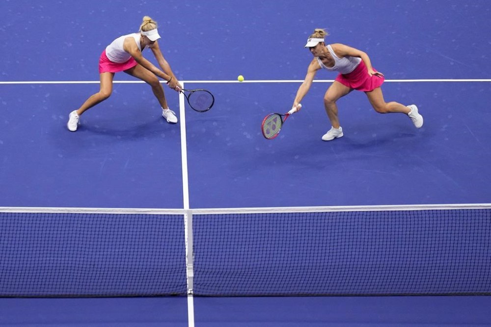 Gabriela Dabrowski, of Canada, right, returns a shot alongside doubles partner Erin Routliffe, of New Zealand, left, during the women's doubles final of the U.S. Open tennis championships on Sunday, Sept. 10, 2023, in New York. Dabrowski and Routliffe were defeated 7-5, 7-5 by Lyudmyla Kichenok of Ukraine and Jelena Ostapenko of Latvia in the women's doubles semifinal at the Australian Open on Friday. (AP Photo/Manu Fernandez)