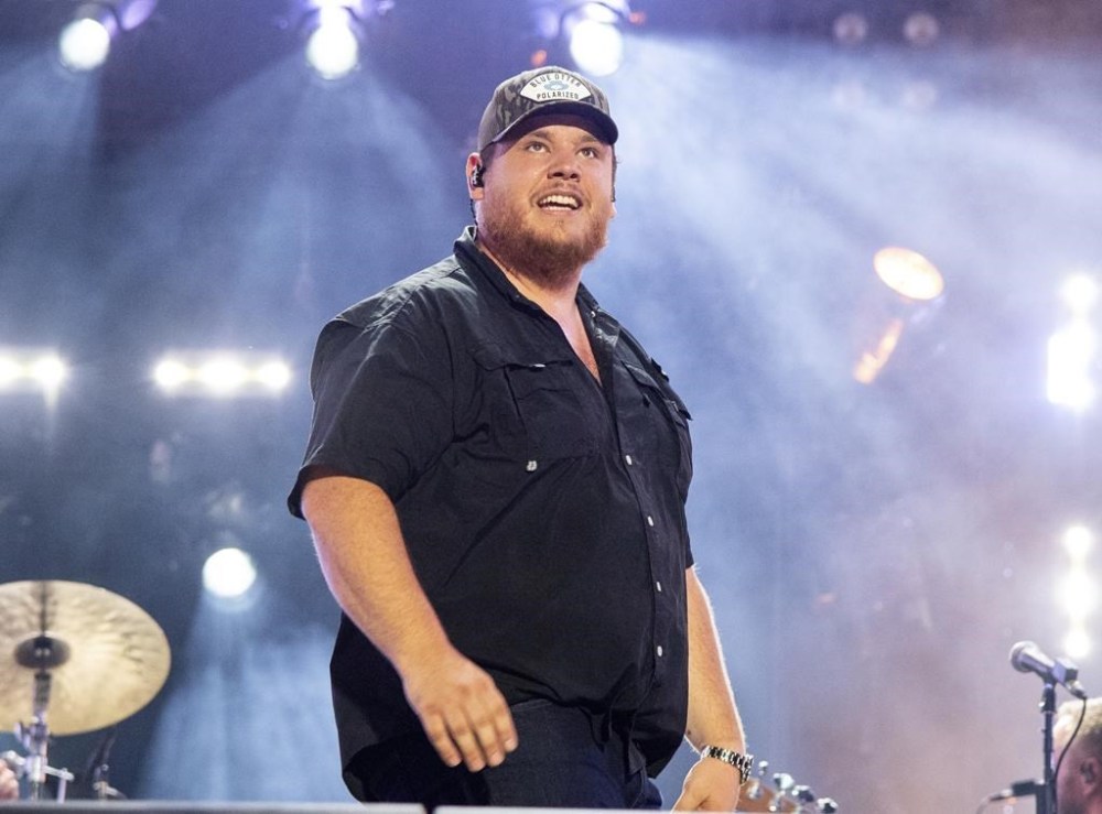 FILE - Luke Combs performs during CMA Fest 2022, June 11, 2022, in Nashville, Tenn. (Photo by Amy Harris/Invision/AP, File)