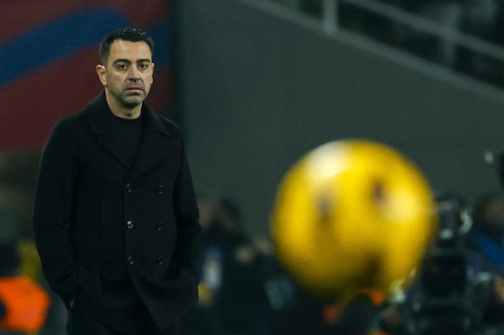 Barcelona's head coach Xavi Hernandez reacts during a Spanish La Liga soccer match between Barcelona and Villarreal at the Olimpic Lluis Companys stadium in Barcelona, Spain, Saturday, Jan. 27, 2024. (AP Photo/Joan Monfort)