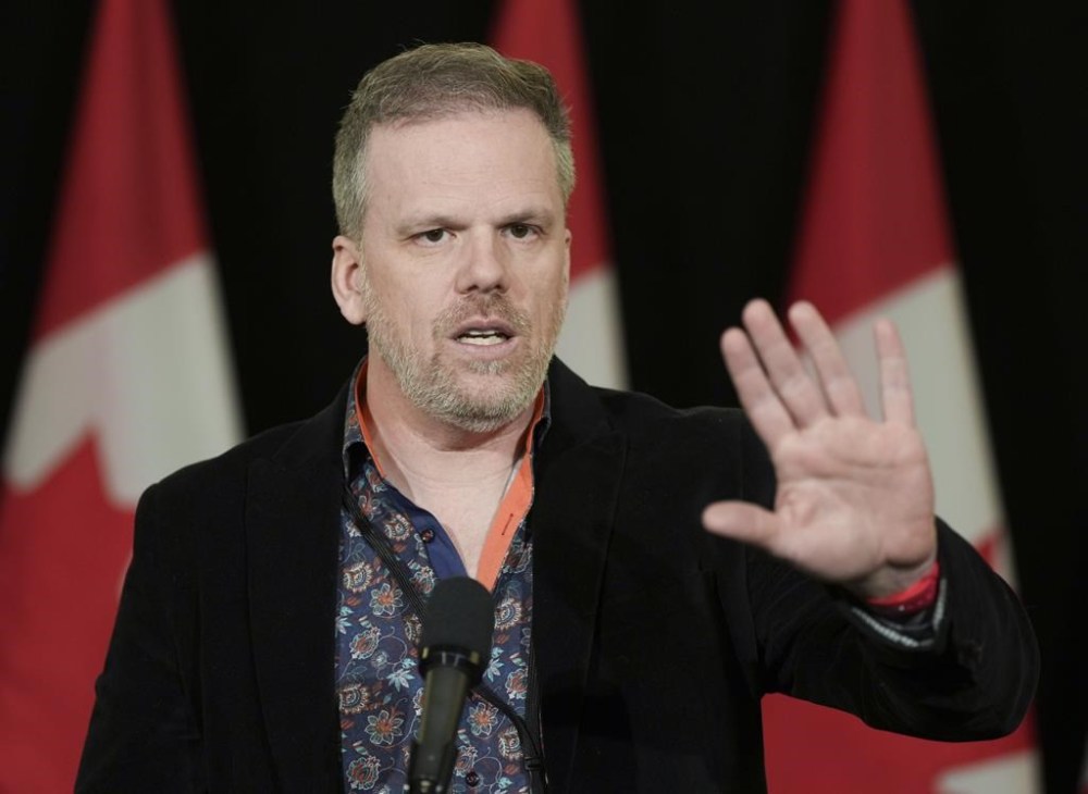 Minister of Health Mark Holland speaks to the media during the federal cabinet retreat in Montreal, Monday, Jan. 22, 2024. THE CANADIAN PRESS/Christinne Muschi