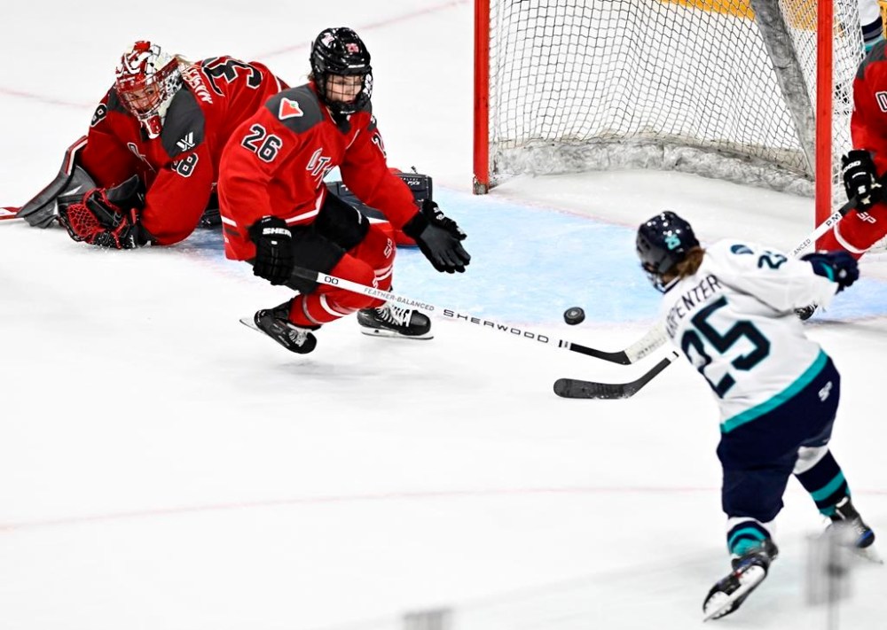 Ottawa's Emerance Maschmeyer (38) watches as Ottawa's Emily Clark (26) is unable to defend against the shot of New York's Alex Carpenter (25), as she scores to tie the game during third period PWHL hockey action in Ottawa, on Sunday, Feb. 4, 2024. THE CANADIAN PRESS/Justin Tang