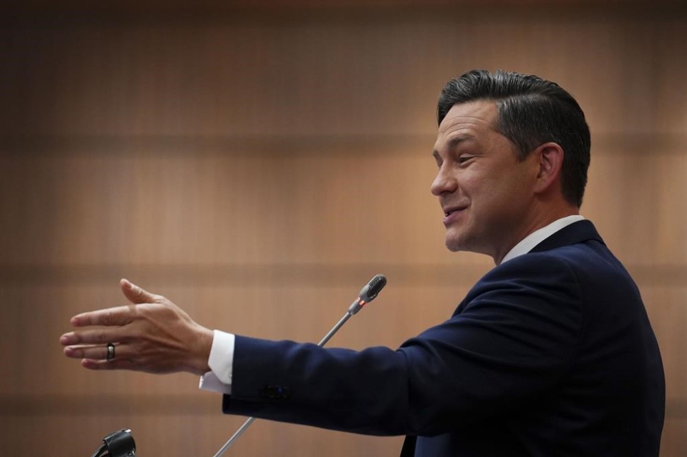 Conservative Leader Pierre Poilievre address the national Conservative caucus on Parliament Hill in Ottawa on Sunday, Jan. 28, 2024. Poilievre says repeat car thieves should not be allowed to serve their sentence