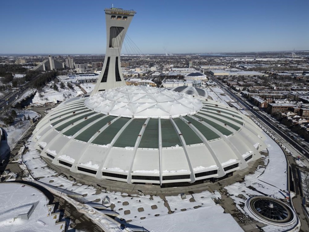 An aerial view of Olympic Stadium in Montreal, Monday Feb. 5, 2024. The Quebec government announced the roof and support ring will be replaced at a cost of $870 million. THE CANADIAN PRESS/Christinne Muschi