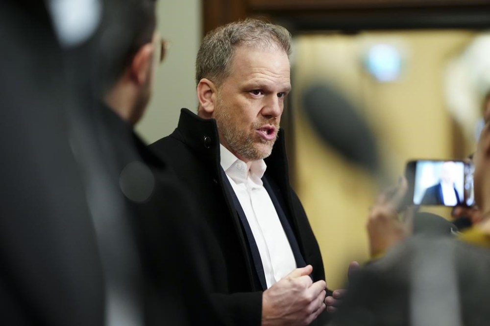 Minister of Health Mark Holland arrives to a cabinet meeting on Parliament Hill in Ottawa on Tuesday, Jan. 30, 2024. Thirteen years ago, in the throes of a major political loss and personal crisis, Mark Holland experienced the darkest period of his life. THE CANADIAN PRESS/Sean Kilpatrick