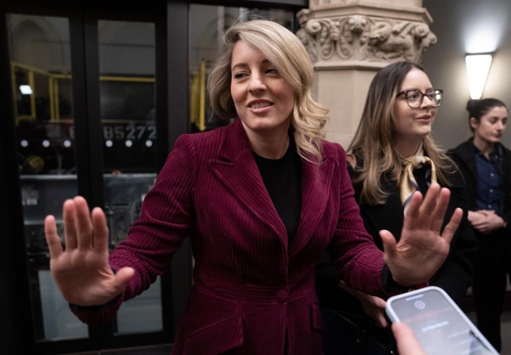 Minister of Foreign Affairs Melanie Joly speaks with reporters before attending cabinet, Tuesday, Feb. 6, 2024 in Ottawa. THE CANADIAN PRESS/Adrian Wyld