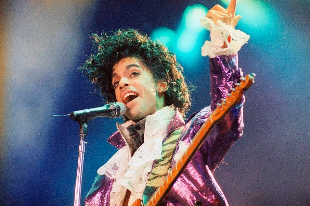 FILE - Prince performs at the Forum in Inglewood, Calif., on Feb. 18, 1985. (AP Photo/Liu Heung Shing, File)