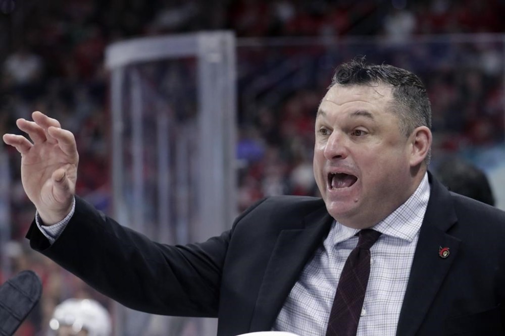 FILE -Ottawa Senators head coach D.J. Smith directs the team during the first period of an NHL hockey game against the Carolina Hurricanes, Tuesday, April 4, 2023, in Raleigh, N.C. Former Ottawa Senators coach D.J. Smith was hired as an assistant coach by the Los Angeles Kings on Tuesday, Feb. 6, 2024. (AP Photo/Chris Seward, File)