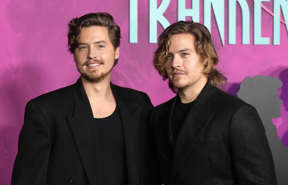 Cole Sprouse, left, a cast member in