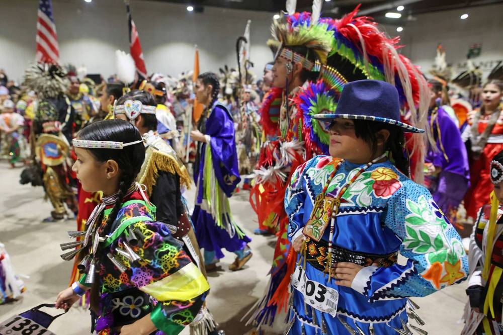 Dancers of all ages take part in the Powwow Grand Entry at the Keystone Centre on Friday evening.