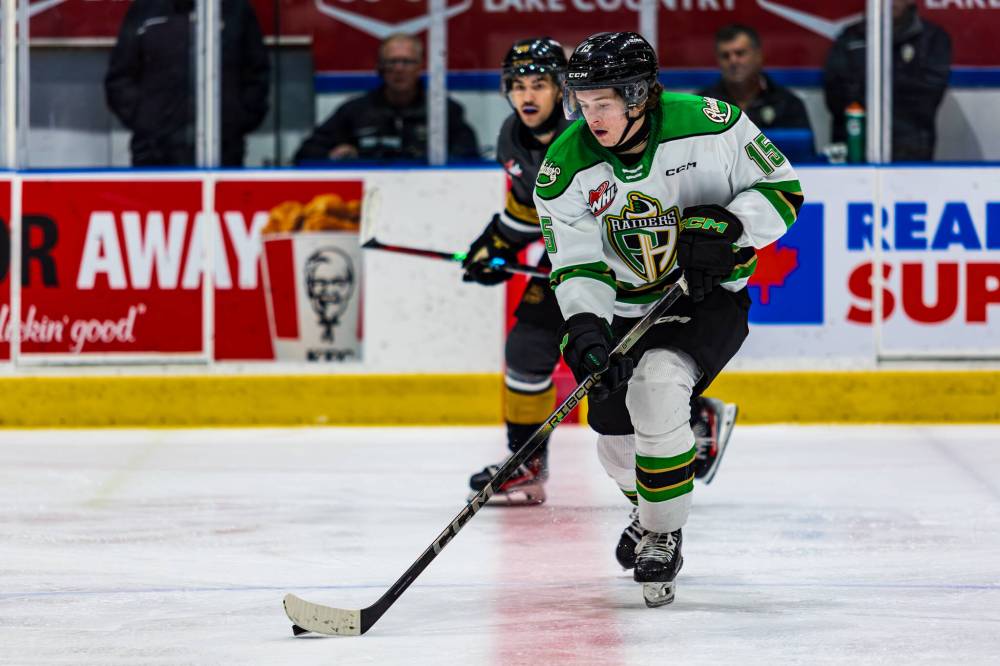 Prince Albert Raiders forward Brayden Dube of Roblin, shown stick handling the puck in front of Brandon Wheat Kings forward Matteo Michels earlier this season at the Art Hauser Centre, has set career offensive highs in his second Western Hockey League campaign. (Mark Peterson/Prince Albert Raiders)