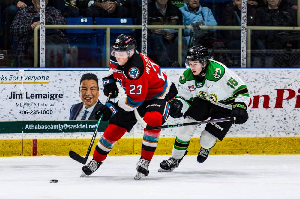 Brayden Dube, shown pursuing Kelowna Rockets defenceman Ethan Mittelsteadt, is expected to help his line win its matchup every game. (Mark Peterson/Prince Albert Raiders)