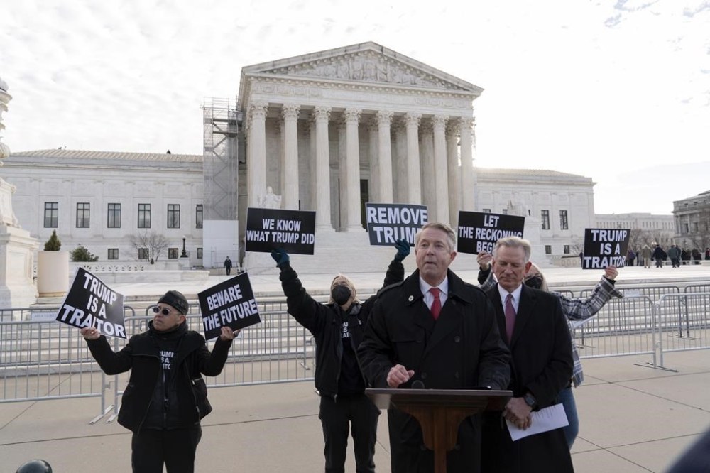 Sen. Roger Marshall R-Kan. and Sen. Tommy Tuberville R-Ala. speak to reporters outside of the U.S. Supreme Court, Thursday, Feb. 8, 2024, in Washington. The U.S. Supreme Court on Thursday will take up a historic case that could decide whether Donald Trump is ineligible for the 2024 ballot under Section 3 of the 14th Amendment. (AP Photo/Jose Luis Magana)