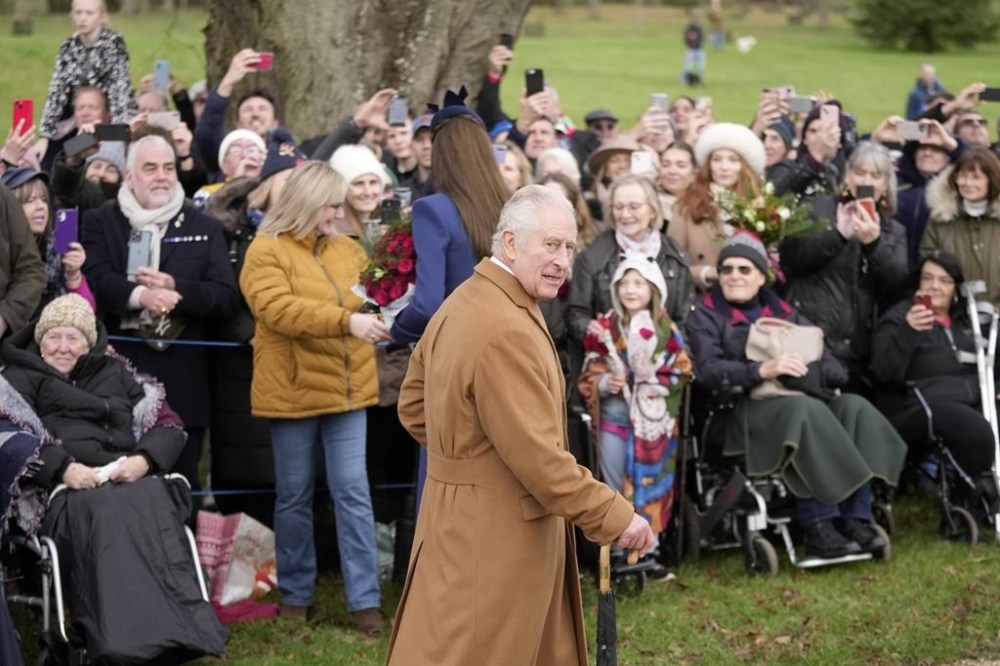 FILE - Britain's King Charles III leaves after attending the Christmas day service at St Mary Magdalene Church in Sandringham in Norfolk, England, on Dec. 25, 2023. Upon receiving his first treatment for cancer, Britain's King Charles III retreated to Sandringham House, a private estate. That's where the monarch has long taken refuge while walking and shooting along the windswept North Sea coast of eastern England. Sandringham, the private home of the last six British monarchs, sits amid parkland, gardens and working farms about 110 miles (180 kilometers) north of London. (AP Photo/Kin Cheung, File)