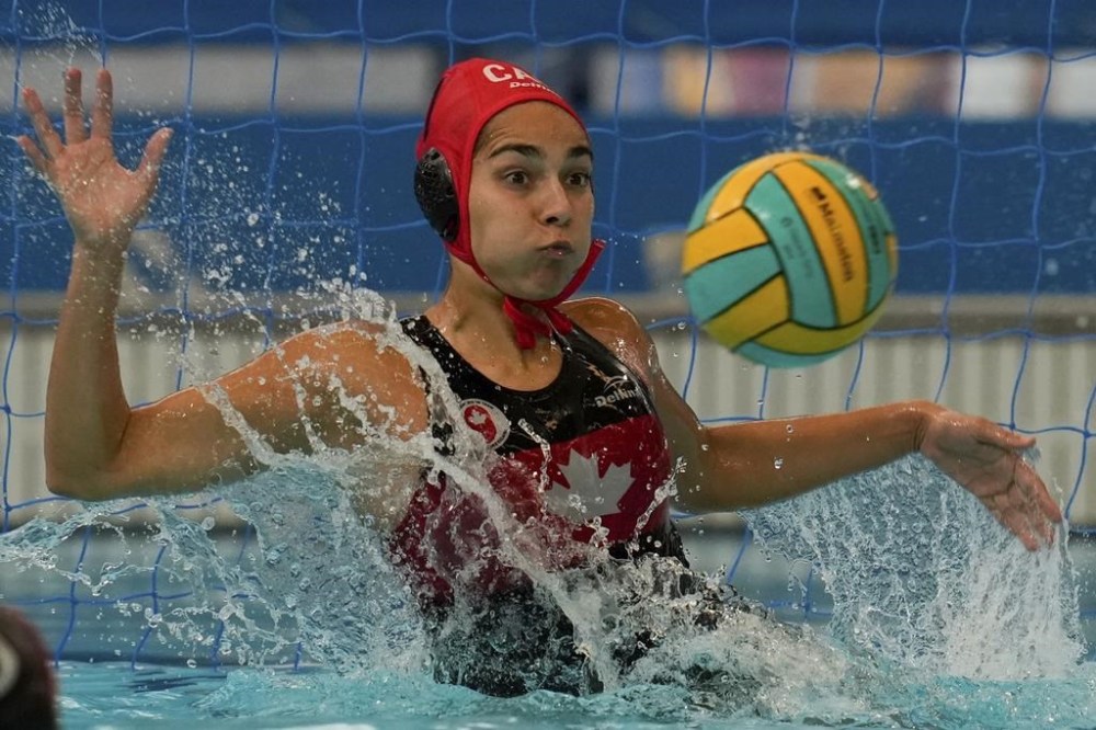 Canada's goalkeeper Jessica Gaudreault blocks a shot during the women's water polo gold medal match against the United States at the Pan American Games in Santiago, Chile, Saturday, Nov. 4, 2023. Canada's women's water polo team has inched one step closer to a potential Olympic qualification. THE CANADIAN PRESS/AP -Matias Delacroix