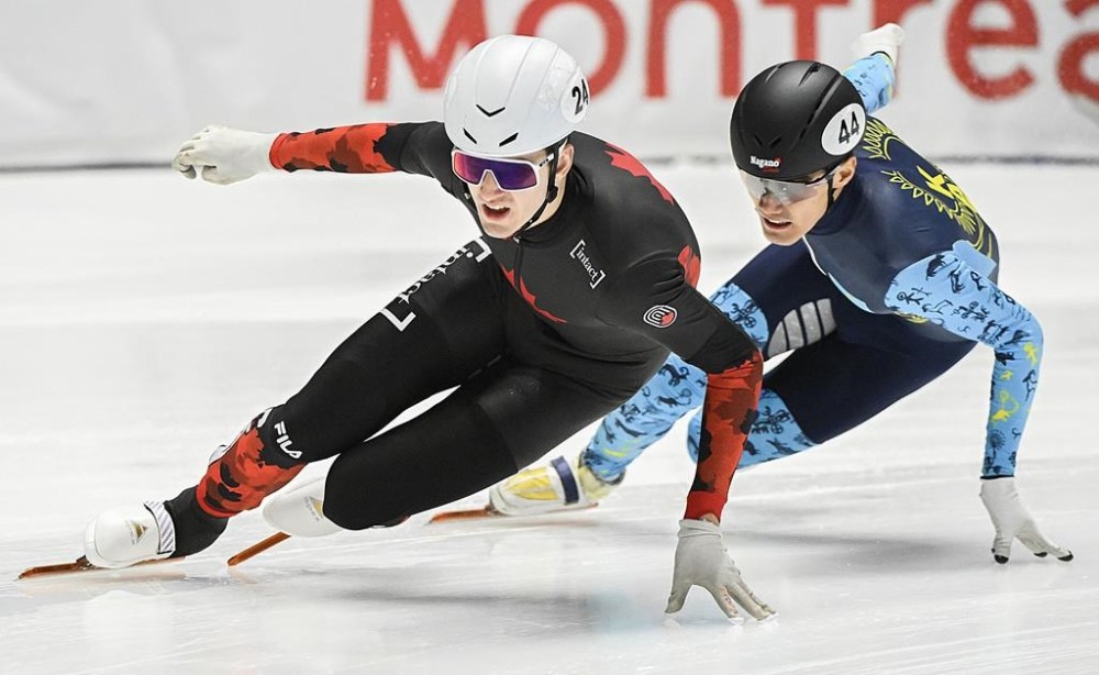 Felix Roussel earned gold to spearhead a second straight three-medal day for Canada in World Cup short track speedskating action on Sunday. Roussel (24) skates ahead of Yerkebulan Shamukhanov of Kazakhstan during the 1500-metre repechage semifinal race at the World Cup short track speedskating event in Montreal, Saturday, October 28, 2023. THE CANADIAN PRESS/Graham Hughes