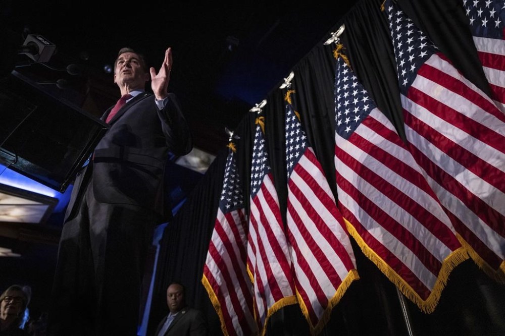 Former U.S. Rep. Tom Suozzi, Democratic candidate for New York's 3rd congressional district, speaks at his election night party Tuesday, Feb. 13, 2024, in Woodbury, N.Y. Suozzi won a special election for the House seat formerly held by George Santos. (AP Photo/Stefan Jeremiah)