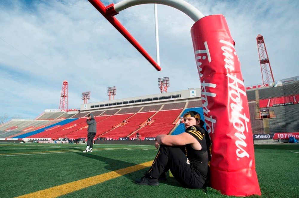 Hamilton Tiger-Cats Dylan Wynn is seen during a practice prior to the 107th Grey Cup in Calgary, Saturday, Nov. 23, 2019. The Montreal Alouettes signed veteran American defensive tackle Wynn on Wednesday. THE CANADIAN PRESS/Nathan Denette