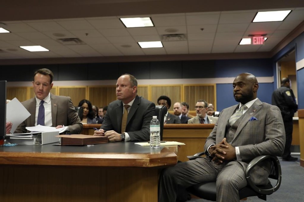 Special Prosecutor Nathan Wade, right, listens during a hearing on the Georgia election interference case, Thursday, Feb. 15, 2024, in Atlanta. The hearing is to determine whether District Attorney Fani Willis should be removed from the case because of a relationship with Wade, special prosecutor she hired in the election interference case against former President Donald Trump. (Alyssa Pointer/Pool Photo via AP)