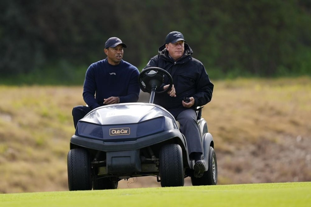 Tiger Woods is driven off the course after withdrawing during the second round of the Genesis Invitational golf tournament at Riviera Country Club Friday, Feb. 16, 2024, in the Pacific Palisades area of Los Angeles. (AP Photo/Ryan Sun)