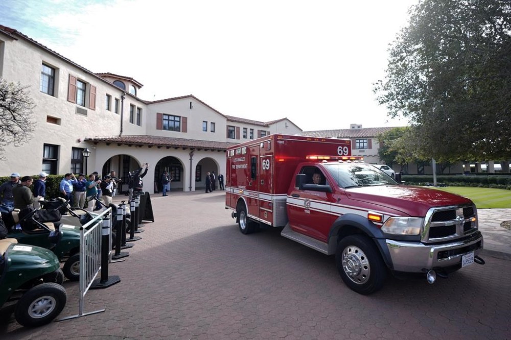 A Los Angeles Fire Department ambulance leaves Riviera Country Club during the second round of the Genesis Invitational golf tournament Friday, Feb. 16, 2024, in the Pacific Palisades area of Los Angeles. The fire department was reportedly on hand to deliver intravenous fluids to golfer Tiger Woods who is said to have had flu symptoms and dehydration. (AP Photo/Ryan Sun)