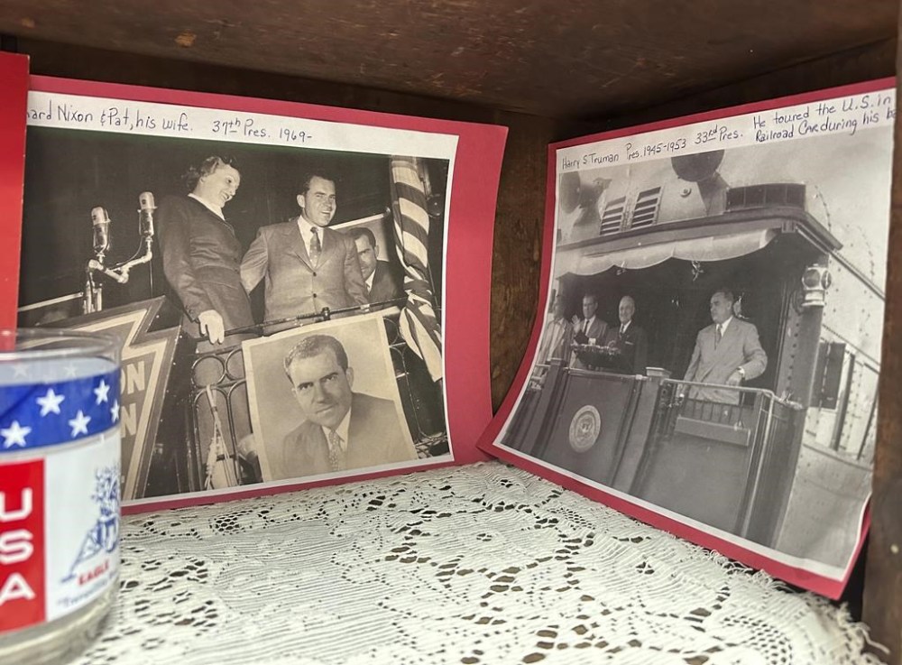 A display at the Crestline Historical Museum in Crestline, Ohio, on Feb. 8, 2024, depicts images of whistle-stop campaign trains that have visited the village over the years. (AP Photo/Julie Carr Smyth)