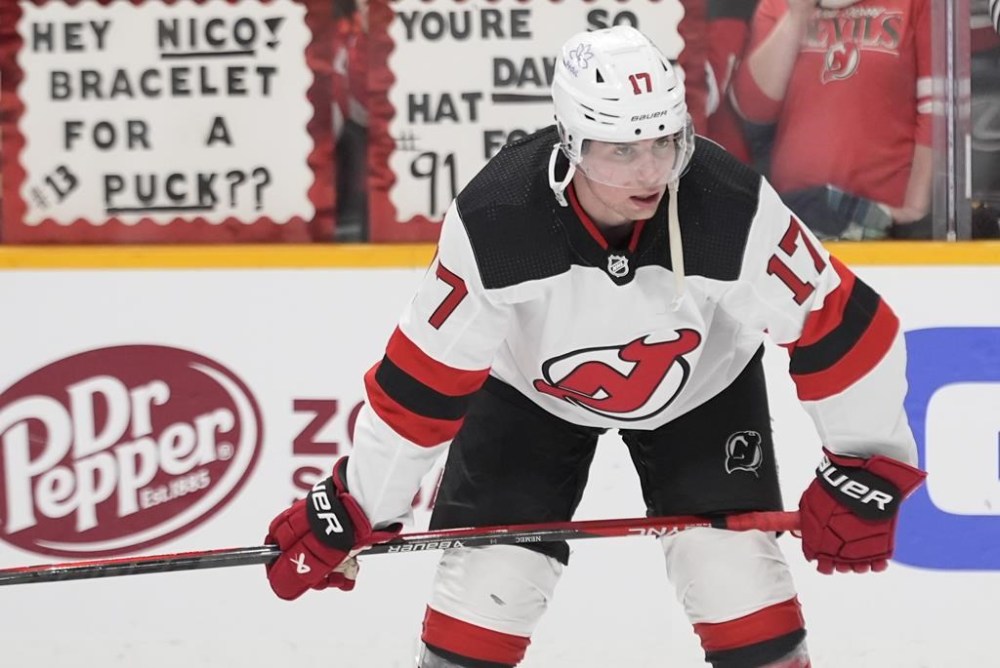 New Jersey Devils defenseman Simon Nemec (17) warms up before the team's NHL hockey game against the Nashville Predators, Tuesday, Feb. 13, 2024, in Nashville, Tenn. (AP Photo/George Walker IV)