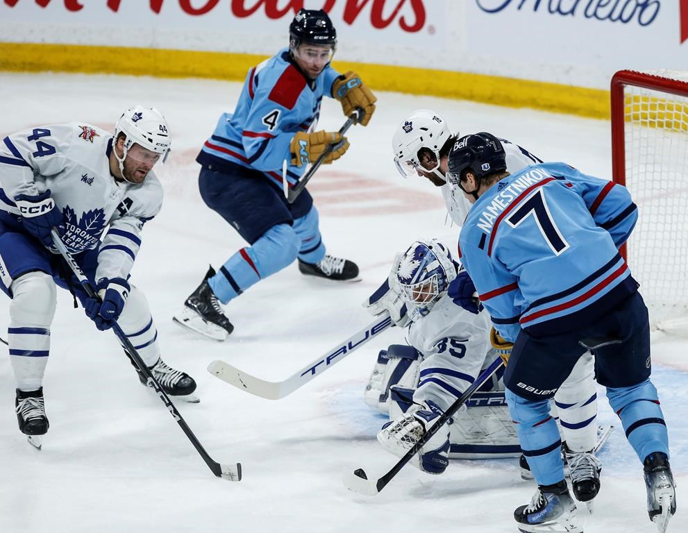 Toronto Maple Leafs goaltender Ilya Samsonov (35) saves the shot as Morgan Rielly (44) and TJ Brodie (78) defend against Winnipeg Jets' Neal Pionk (4) and Vladislav Namestnikov (7) during second-period NHL action in Winnipeg on Saturday, January 27, 2024. Rielly was suspended five games by the NHL's department of player safety after he delivered a cross-check to the head of Senators forward Ridly Greig in the dying moments of Ottawa's 5-3 victory on Feb. 10, the Toronto Maple Leafs defenceman addressed the situation for the first time Wednesday. THE CANADIAN PRESS/John Woods