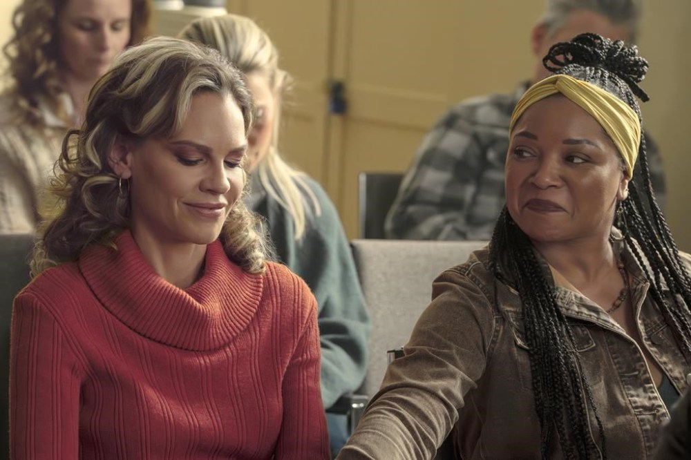 This image released by Lionsgate shows Hilary Swank, left, and Tamala Jones in a scene from