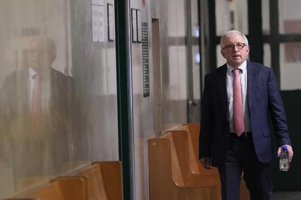 Eagles manager Irving Azoff leaves supreme court after testifying, Wednesday, Feb. 21, 2024, in New York. A criminal case involving handwritten lyrics to the classic rock megahit
