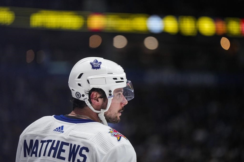 Toronto Maple Leafs' Auston Matthews waits for a faceoff during the third period of an NHL hockey game against the Vancouver Canucks in Vancouver, on Saturday, January 20, 2024. Toronto centre Auston Matthews has scored his 50th goal of the season in 54 games in the Maple Leafs' NHL contest at Arizona. THE CANADIAN PRESS/Darryl Dyck