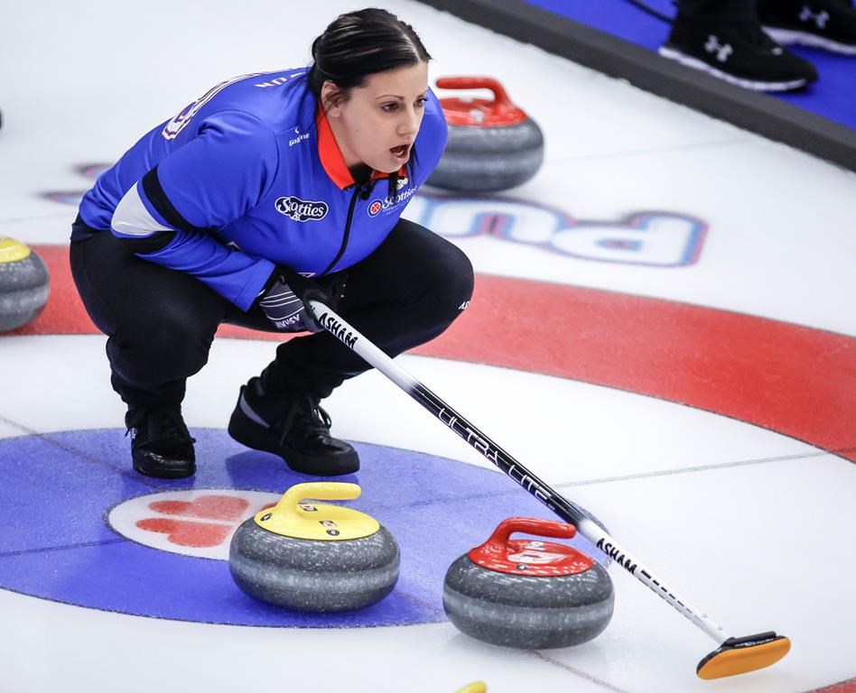 Team Manitoba-Cameron skip Kate Cameron directs her teammates as they play Team Manitoba-Jones at the Scotties Tournament of Hearts in Calgary, Wednesday, Feb. 21, 2024. Cameron scored one in the 10th end for a crucial 5-4 win over Nova Scotia's Heather Smith in Thursday's opening draw at the Canadian women's curling championship. THE CANADIAN PRESS/Jeff McIntosh