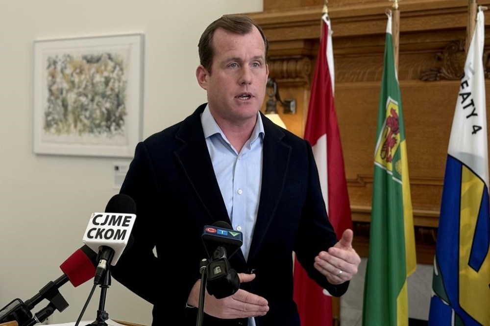 Saskatchewan Opposition NDP finance critic Trent Wotherspoon speaks to reporters at the Saskatchewan Legislature Building in Regina, Thursday, Feb. 22, 2024. He says he has questions over the province spending $750 million that was not in the budget. THE CANADIAN PRESS/Jeremy Simes