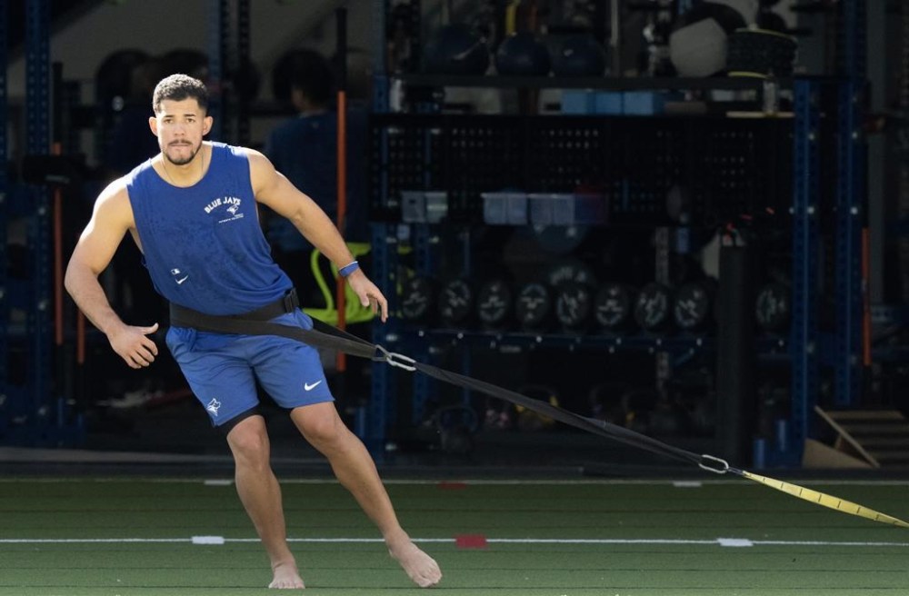 Toronto Blue Jays pitcher Jose Berrios pulls a weight sled during a Spring Training workout in Dunedin, Fla. on Thursday, February 22, 2024. THE CANADIAN PRESS/Frank Gunn