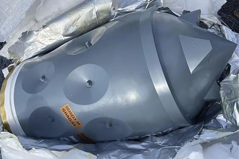 This image released by the U.S. Department of Justice in an FBI affidavit filed in U.S. District Court, Alexandria, Va., shows what is described as Iranian-made warhead bound for Yemen's Houthi seized off a vessel in the Arabian Sea. Four foreign nationals were charged Thursday, Feb. 22, 2024, with transporting suspected Iranian-made weapons on a vessel intercepted by U.S. naval forces in the Arabian Sea last month. Two Navy SEALs died during the mission. (U.S. Department of Justice via AP, File)