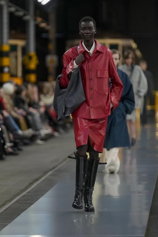 A model wears a creation as part of the Tod's women's Fall-Winter 2024-25 collection presented in Milan, Italy, Friday, Feb. 23, 2024. (AP Photo/Luca Bruno)