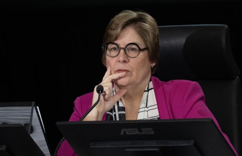 Commissioner Justice Marie-Josee Hogue looks around the room as she listens at the Public Inquiry Into Foreign Interference in Federal Electoral Processes and Democratic Institutions, Monday, January 29, 2024 in Ottawa. The head of a federal inquiry into foreign interference says the government has told her it will be necessary to hear some evidence behind closed doors. THE CANADIAN PRESS/Adrian Wyld