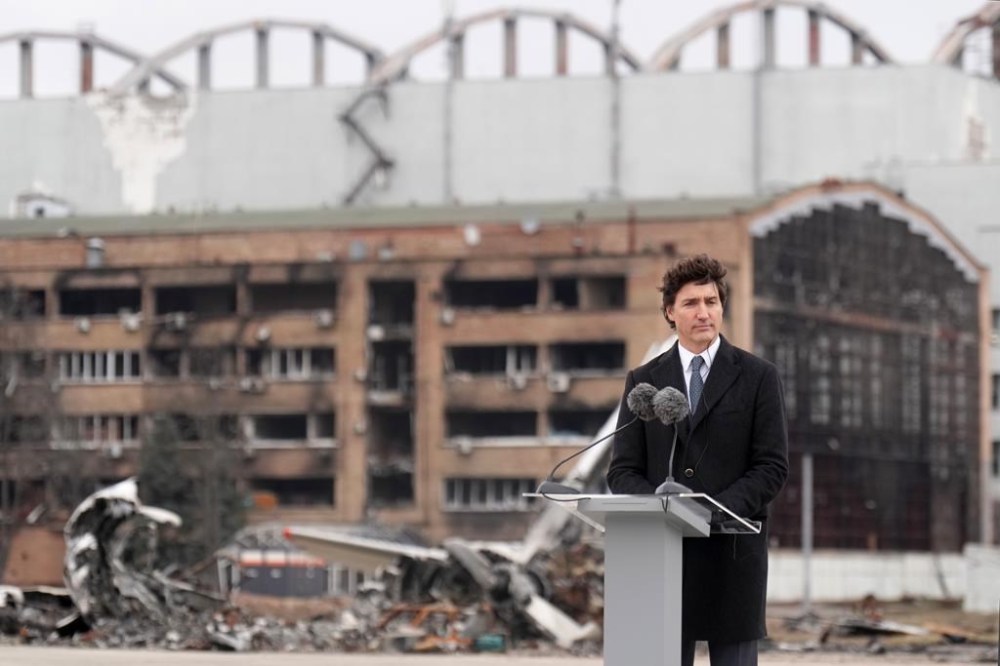 Prime Minister Justin Trudeau pauses during a ceremony at Hostomel Airport in Kyiv, Ukraine on Saturday, February 24, 2024. Trudeau is in the war-ravaged country to help mark the 2nd anniversary of the start of Russia's unprovoked invasion. THE CANADIAN PRESS/Nathan Denette