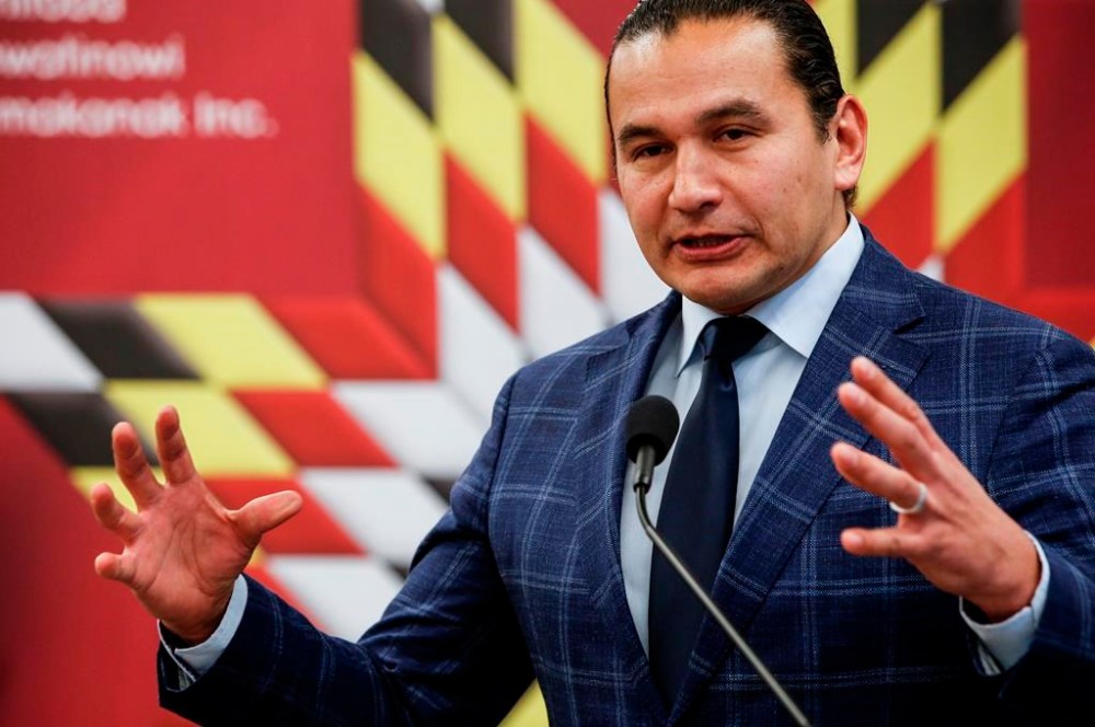 Manitoba Premier Wab Kinew speaks at an event in Winnipeg, Thursday, Jan. 18, 2024. The Manitoba government is outlining new measures that it says will make the bail system stronger. THE CANADIAN PRESS/John Woods