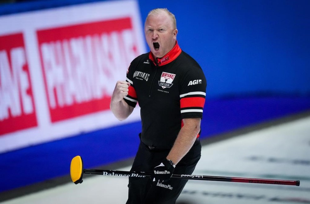 Ontario skip Scott Howard celebrates after scoring three with his final rock in the 10th end to defeat British Columbia 7-5 during the Brier, in Regina, on Saturday, March 2, 2024. THE CANADIAN PRESS/Darryl Dyck