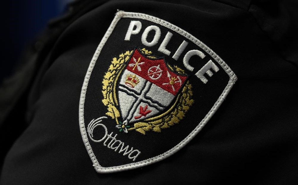 An arm patch is seen on an Ottawa Police Service officer during a news conference, in Ottawa, Wednesday, Sept. 6, 2023. THE CANADIAN PRESS/Adrian Wyld