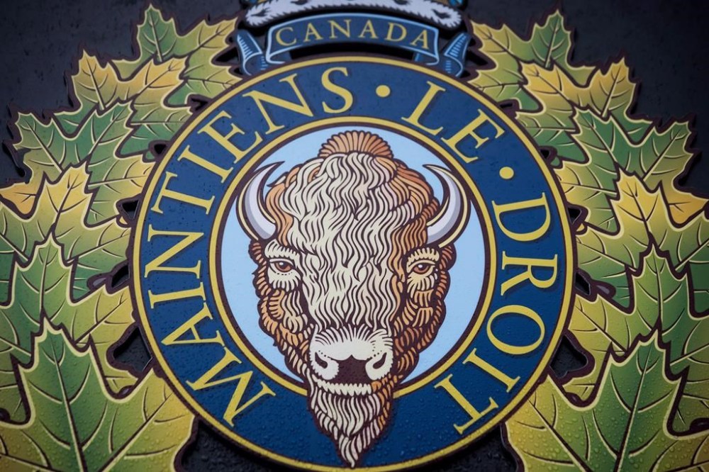 The union that represents front-line Mounties is urging the federal government to make the RCMP the police of jurisdiction for Parliament Hill to bolster security. The RCMP logo is seen outside Royal Canadian Mounted Police