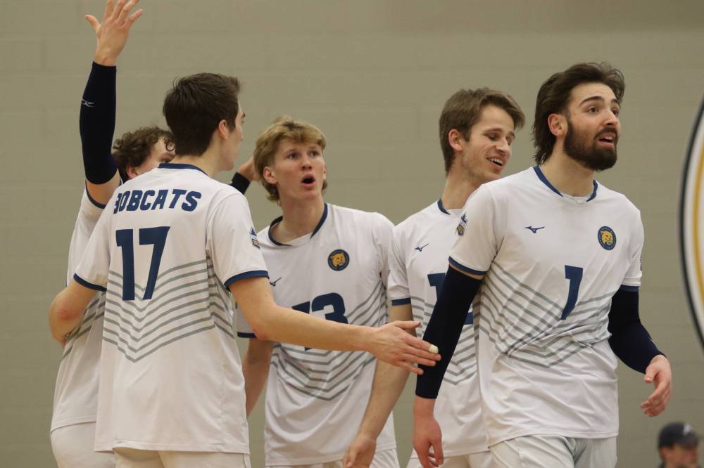 The Brandon University Bobcats turn towards the official, disagreeing with a call during their match against the Mount Royal Cougars in Canada West men's volleyball action at the Healthy Living Centre on Saturday. (Thomas Friesen/The Brandon Sun)