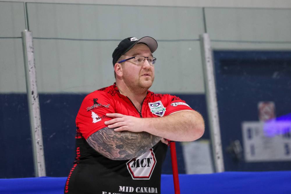 Lead Justin Twiss of Team Riley Smith from the Charleswood Curling Club observes the action from his sheet during in the Viterra Championship earlier this week. Smith beat No.1 seed Reid Carruthers on Friday to reach the playoff round. (Winnipeg Free Press)