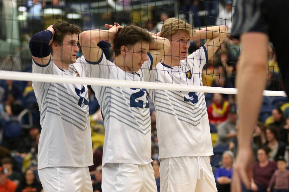 Paycen Warkentin, centre, is set to graduate from Brandon University this spring. (Thomas Friesen/The Brandon Sun)