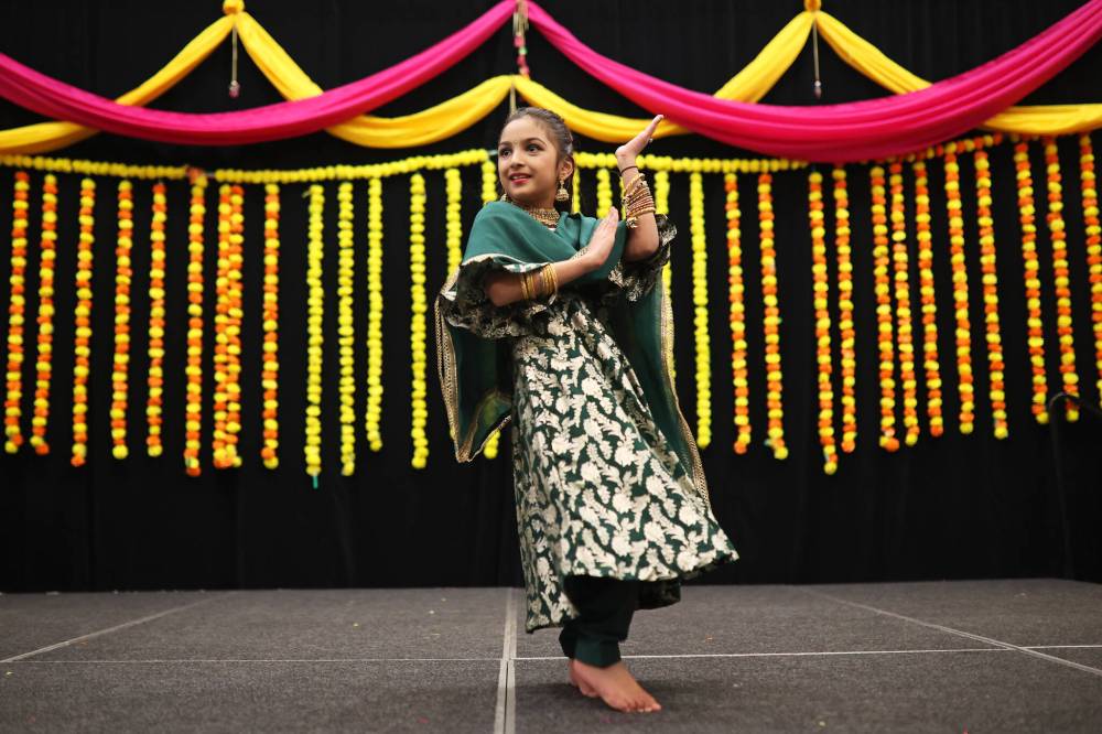 Gabbi Badhwain dances for visitors to the India pavilion in the Victoria Inn Imperial Ballroom during day two of the Westman Multicultural Festival on Friday evening. (Photos by Tim Smith/The Brandon Sun)