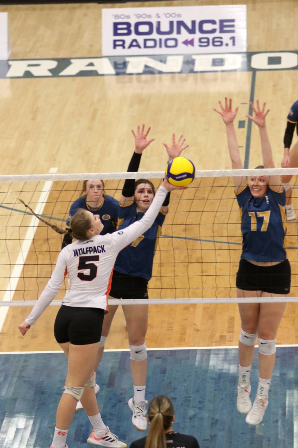 Brandon University Bobcats Kallie Ball (7) and Camryn Hildebrand attempt to block Thompson Rivers attacker Brooklyn Olfert during their final Canada West women's volleyball match on home court on Saturday. (Thomas Friesen/The Brandon Sun)