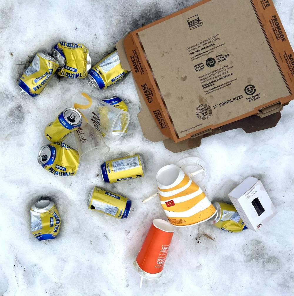 Cans of Twisted Tea and assorted litter are strewn on the parking lot of McDiarmind Drive Alliance Church in Brandon's west end. (Submitted)