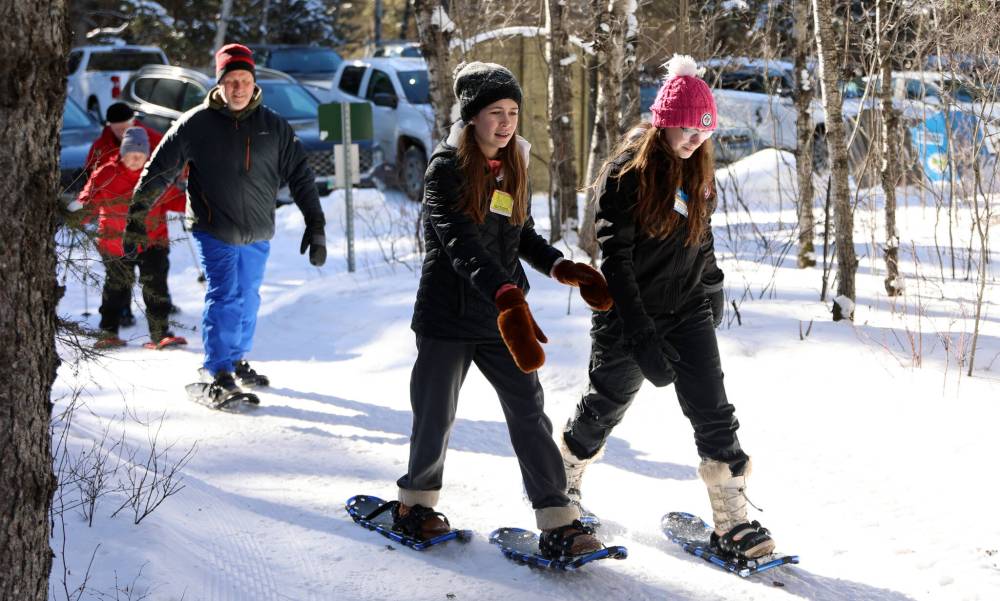 Snowshoers set off on a guided tour of the Brulé Trail in Riding Mountain National Park on Saturday led by volunteers from Friends of Riding Mountain National Park. (Colin Slark/The Brandon Sun)